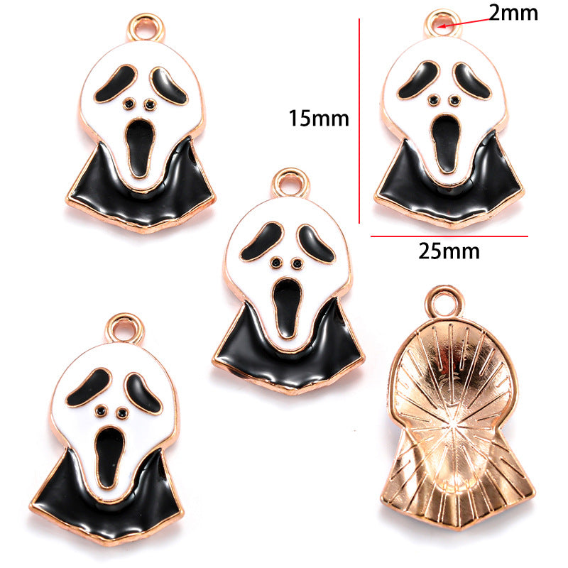 Five ghost-shaped charms with black enamel and rose gold borders, 15mm by 25mm