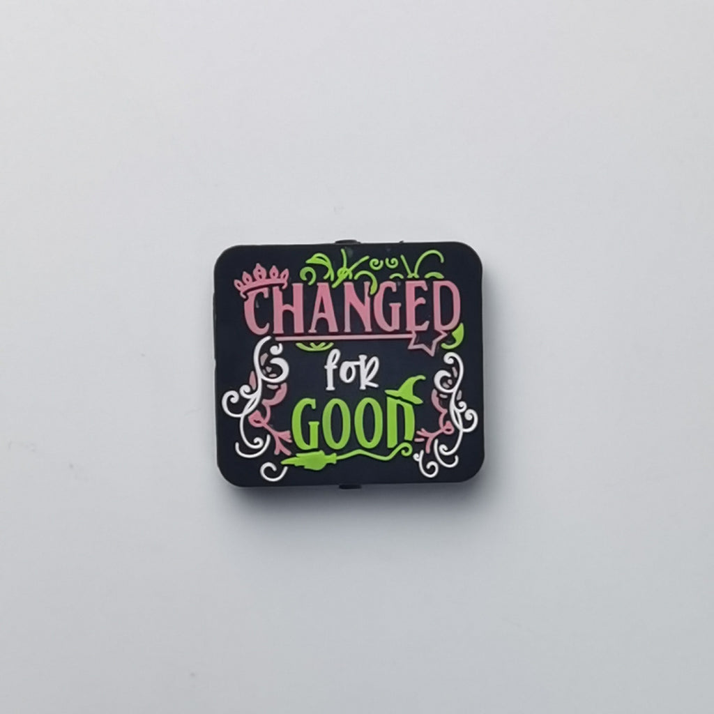 Square black bead with Changed for Good text in pink and green