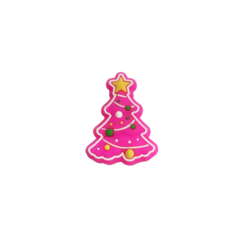 Pink Christmas tree silicone focal bead with a gold star and colorful dot decorations on white.