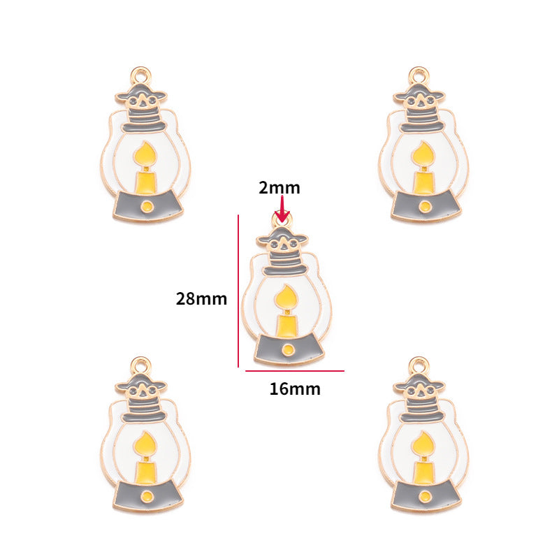 Five white and gray enamel lantern charms with yellow candle flames and gold-tone trim, 28mm by 16mm