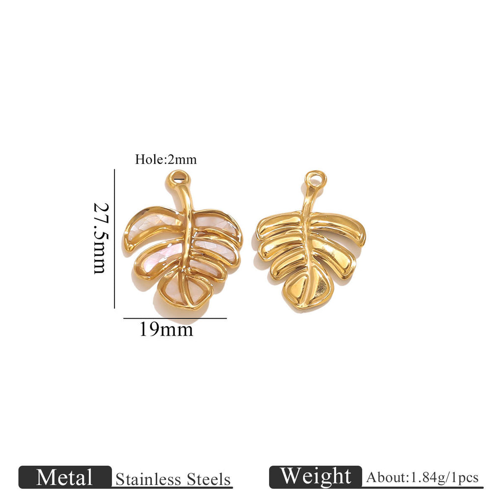 Gold leaf-shaped pendants with measurements on a white background