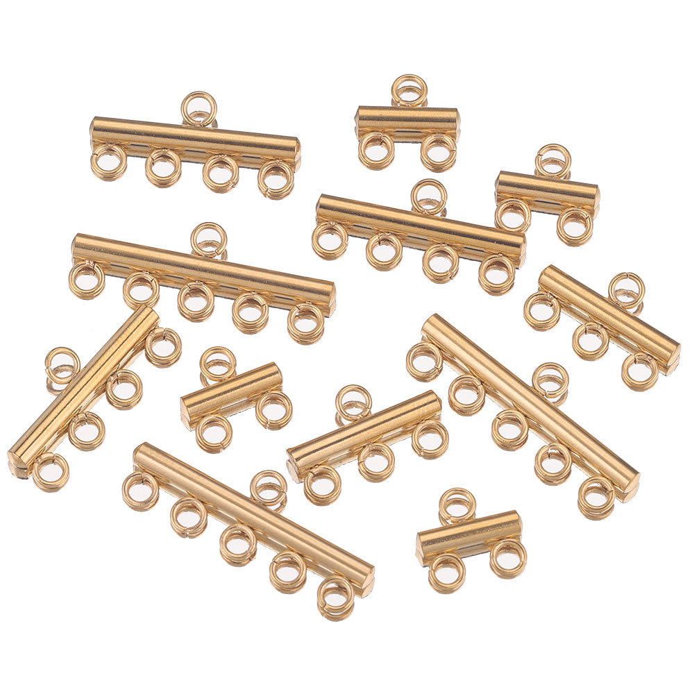 Gold-toned stainless steel multi-loop connector bars scattered on white background