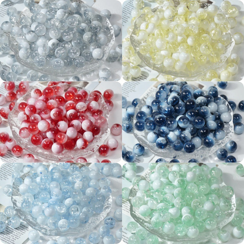 Six bowls of two-tone ice-crackle glass beads in white, pale yellow, red, dark blue, light blue and mint green