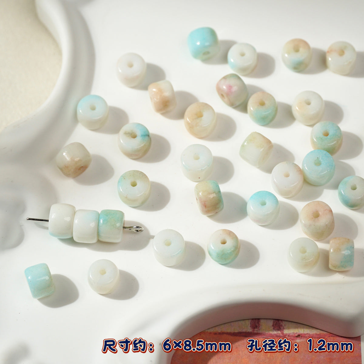 Small round porcelain beads in pastel light blue, mint green, cream, peach
