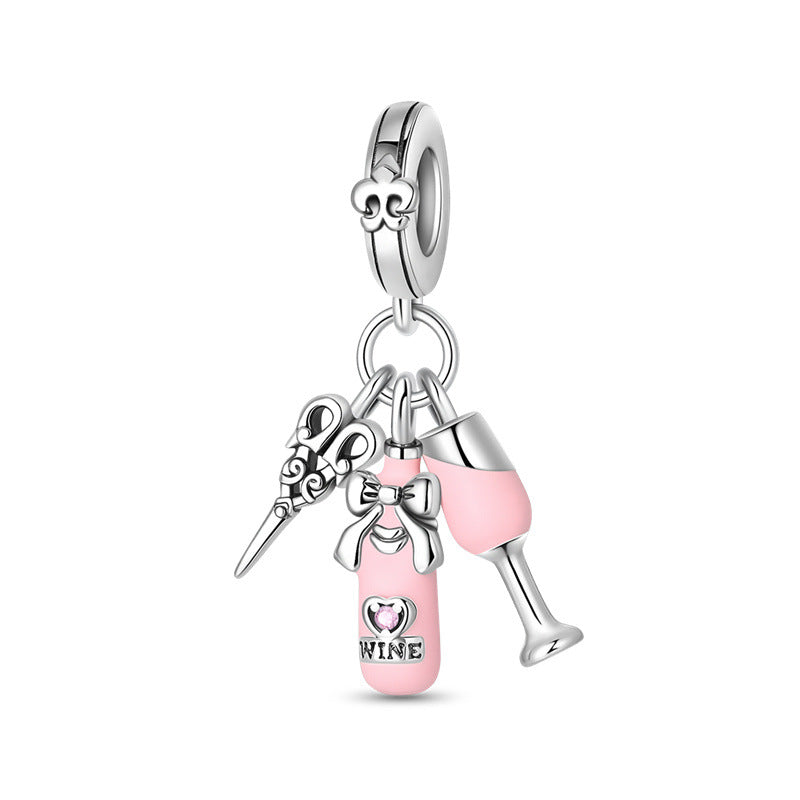 Silver-plated dangle charm with pink wine bottle, wine glass, and scissors pendants