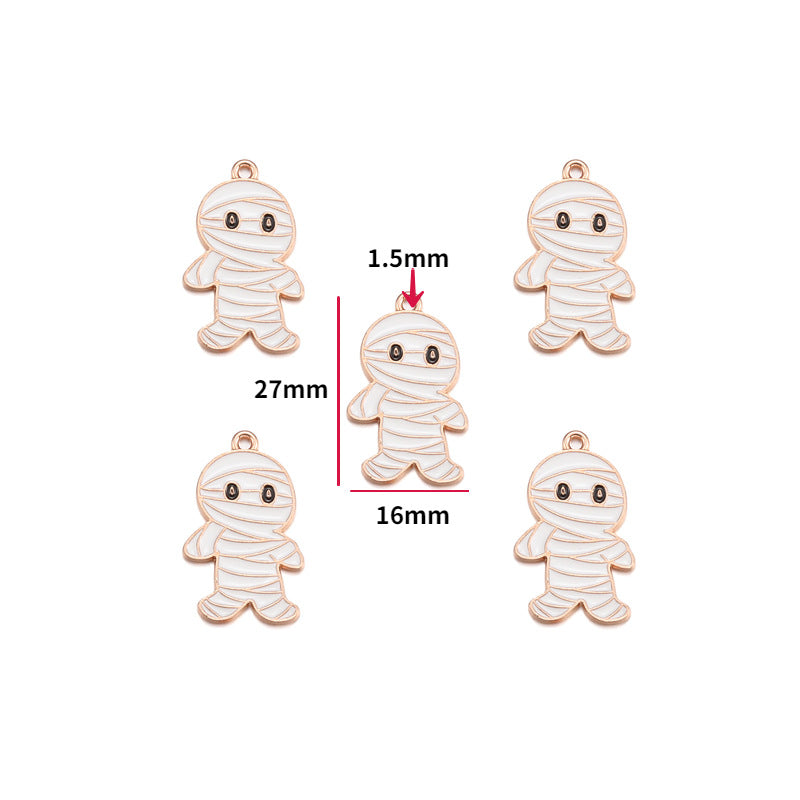 Five mummy-shaped jewelry charms with a rose gold-tone outline and white wrap details, arranged on a white background with red dimension lines and text showing 27mm height, 16mm width, and 1.5mm eye spacing.