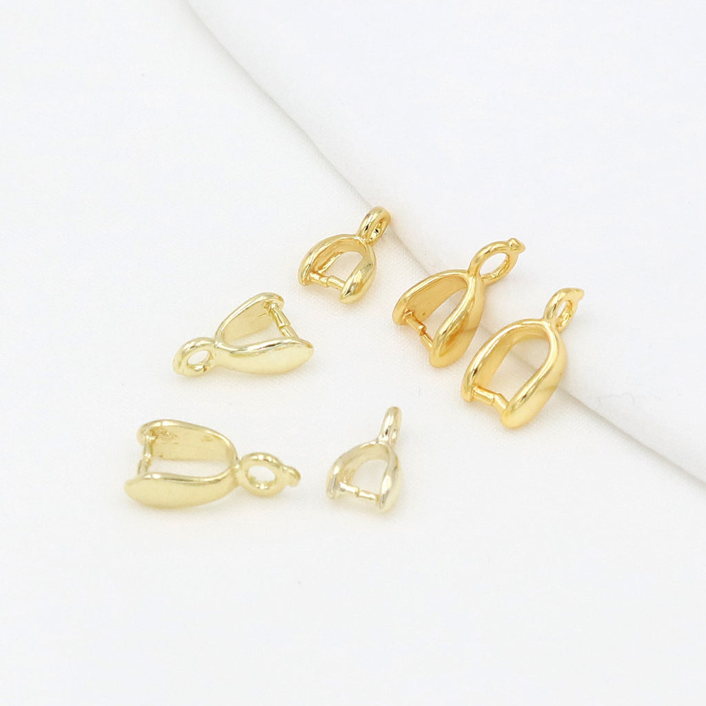 Six gold-plated pinch bail pendant clasps in two shapes arranged on a clean white background
