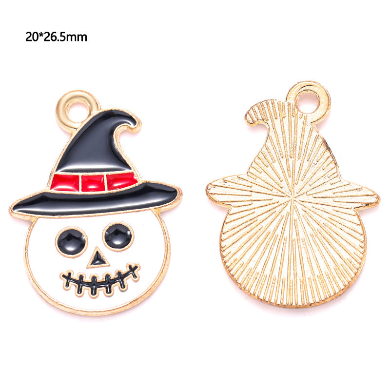 Two gold-tone jack-o'-lantern charms with witch hats, front and back, 20 by 26.5mm