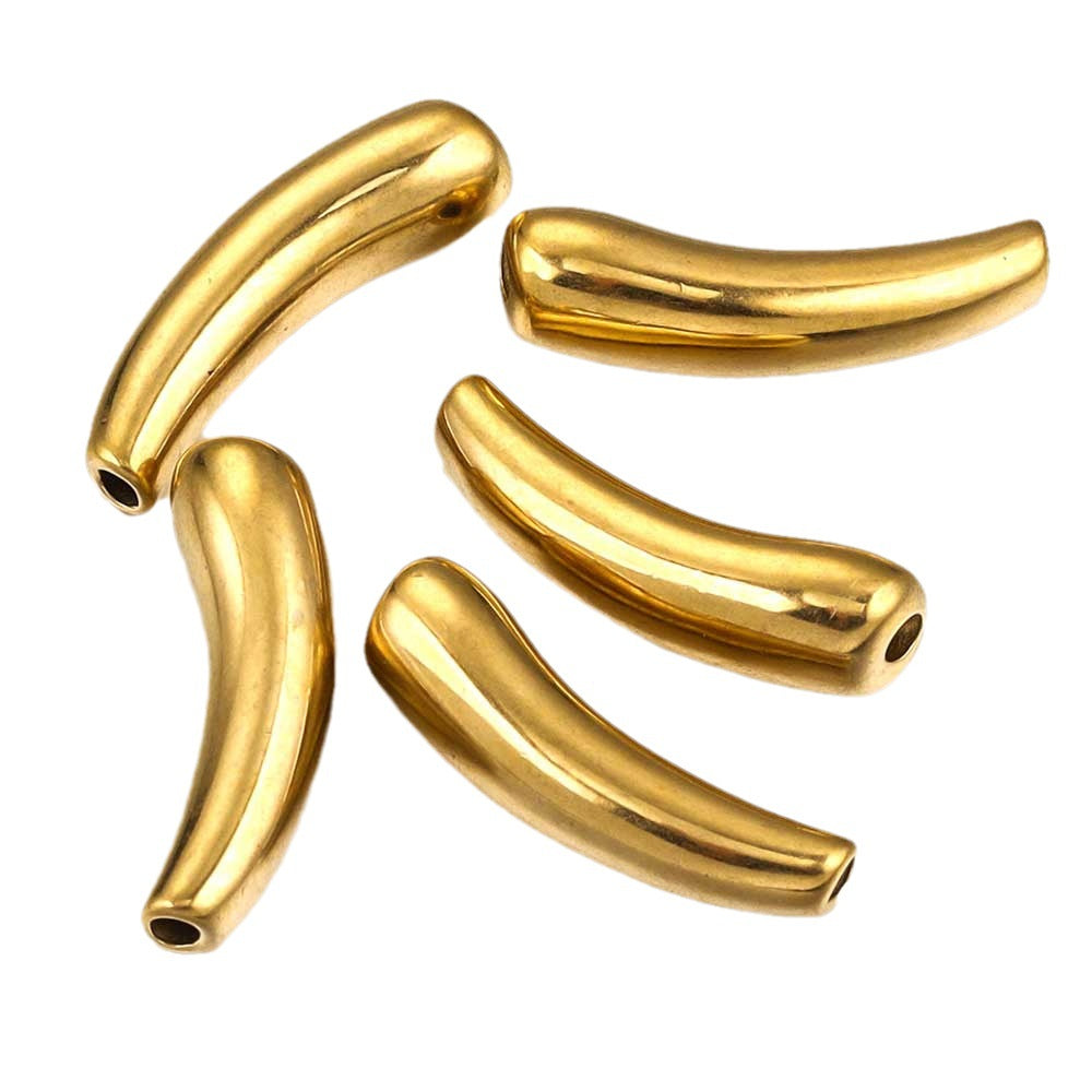 Five curved metallic gold beads with hollow centers, arranged on a plain white background.