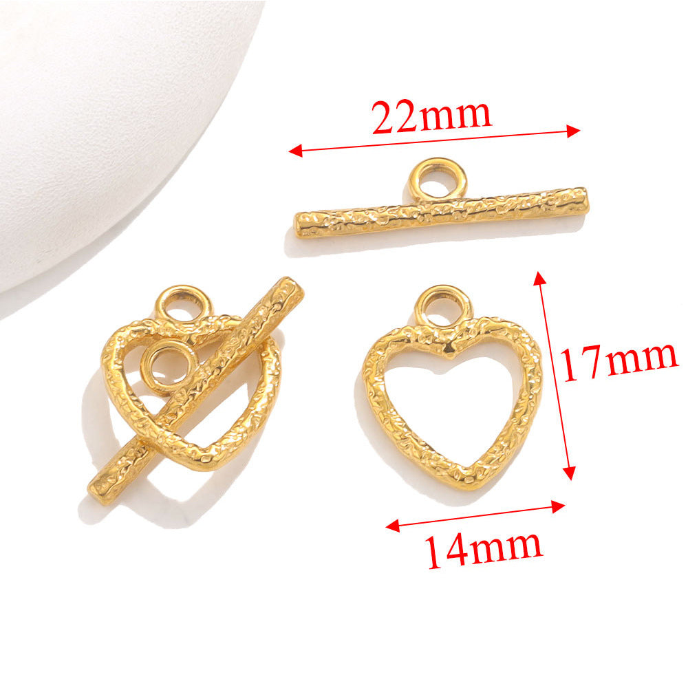 Gold textured heart-shaped toggle clasps with red dimension arrows showing 22mm, 17mm, and 14mm on white background
