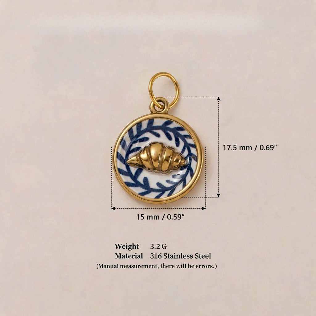 Round pendant charm with blue leaf pattern and gold croissant, shown with size measurements.