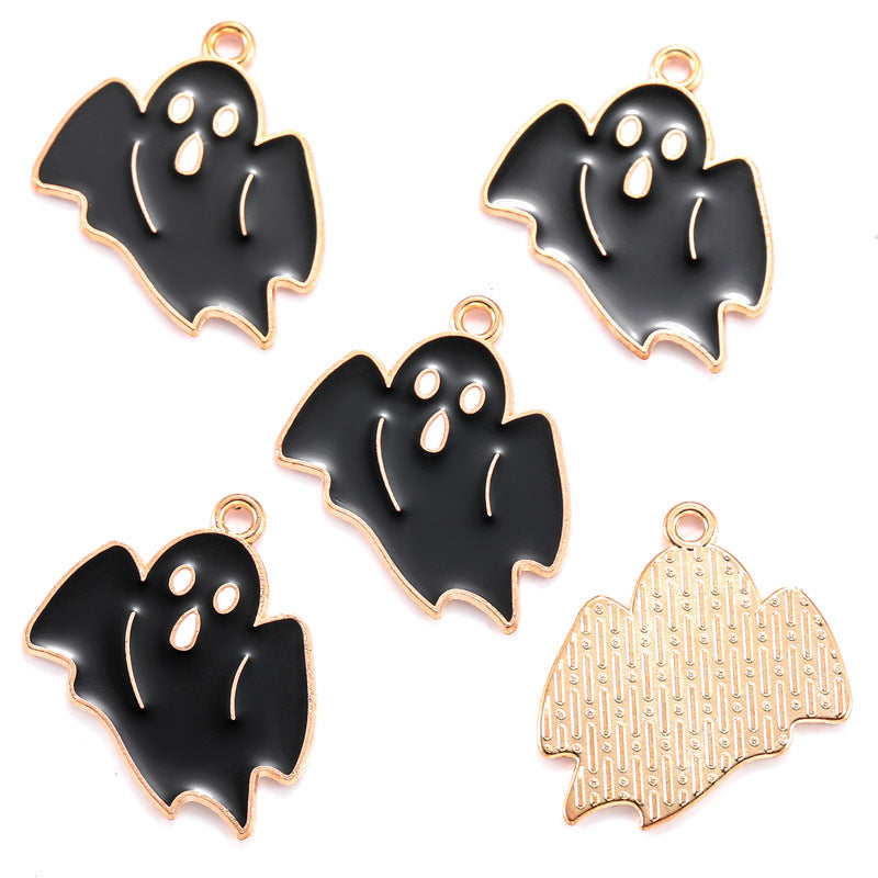 Five ghost-shaped jewelry charms or pendants on a white background, showing both a black enamel finish with rose gold trim and a textured rose gold back.