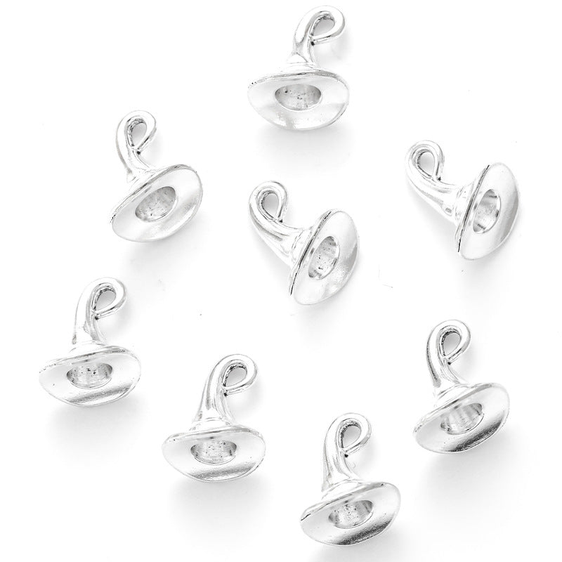 Nine silver witch hat charms with pointed tops and hanging loops arranged on a white background.