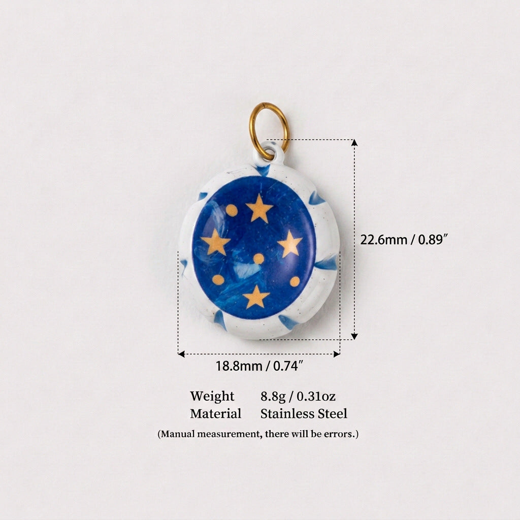 Oval blue pendant charm with gold stars and white border, shown with size measurements.