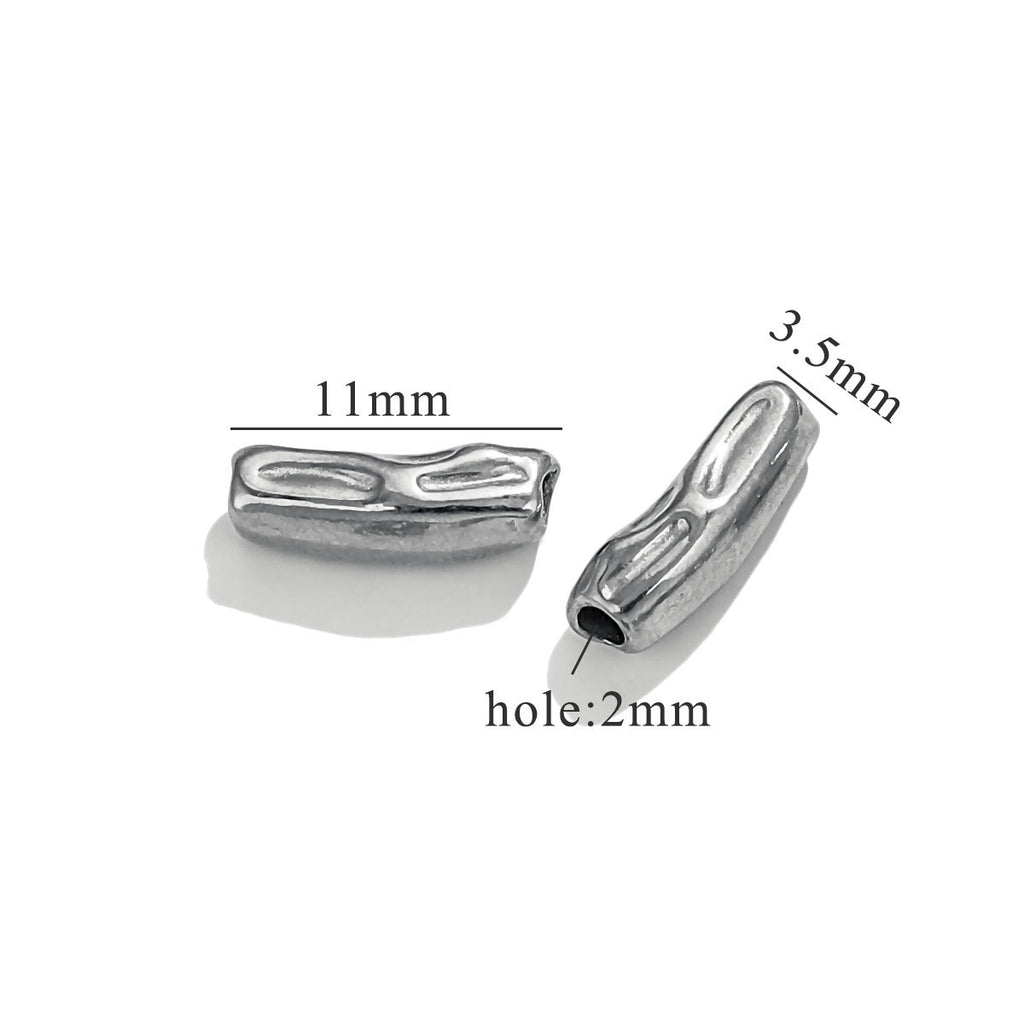 Two steel-color baroque irregular spacer beads with size measurements on white background