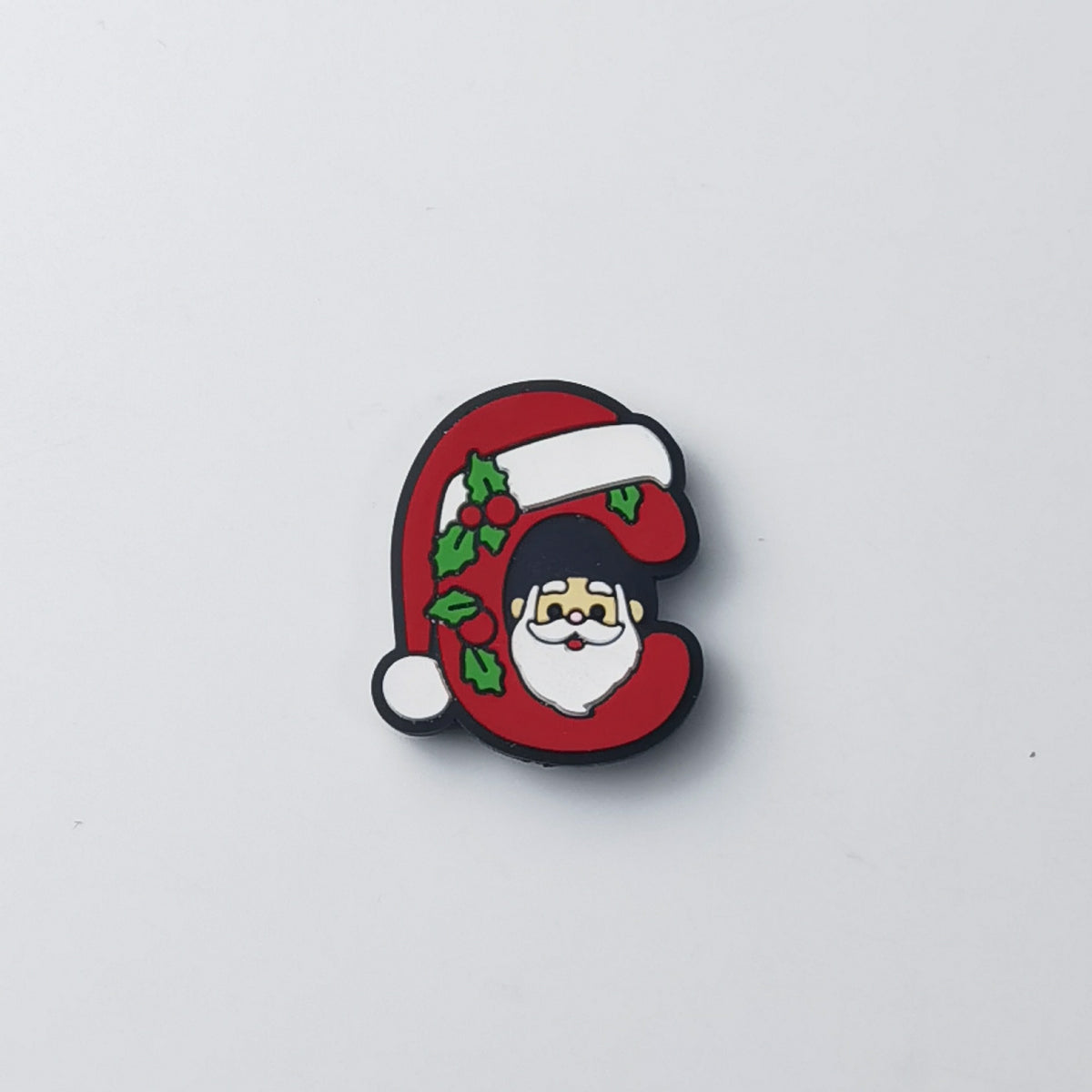 Red silicone letter C focal bead with cartoon Santa Claus face, green holly leaves and red berries