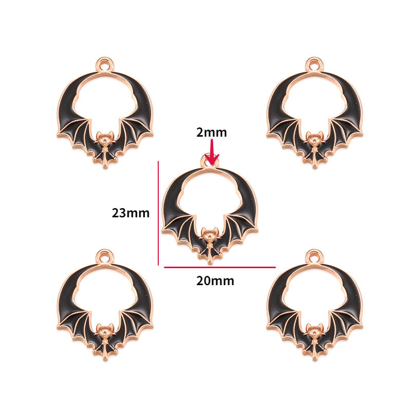 Five black enamel bat charms with rose gold outlines, 23mm