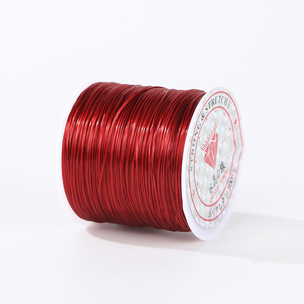 Red 0.8mm flat elastic beading cord spool shown at a three-quarter angle, printed label visible, white background