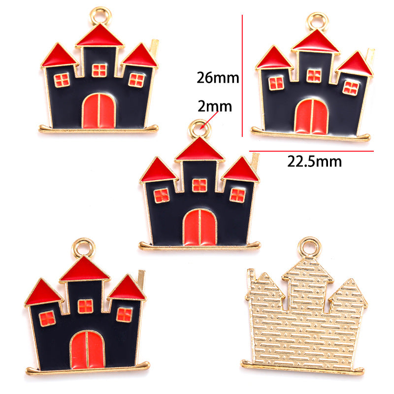 Five castle-shaped charms with black and red enamel, 26mm by 22.5mm