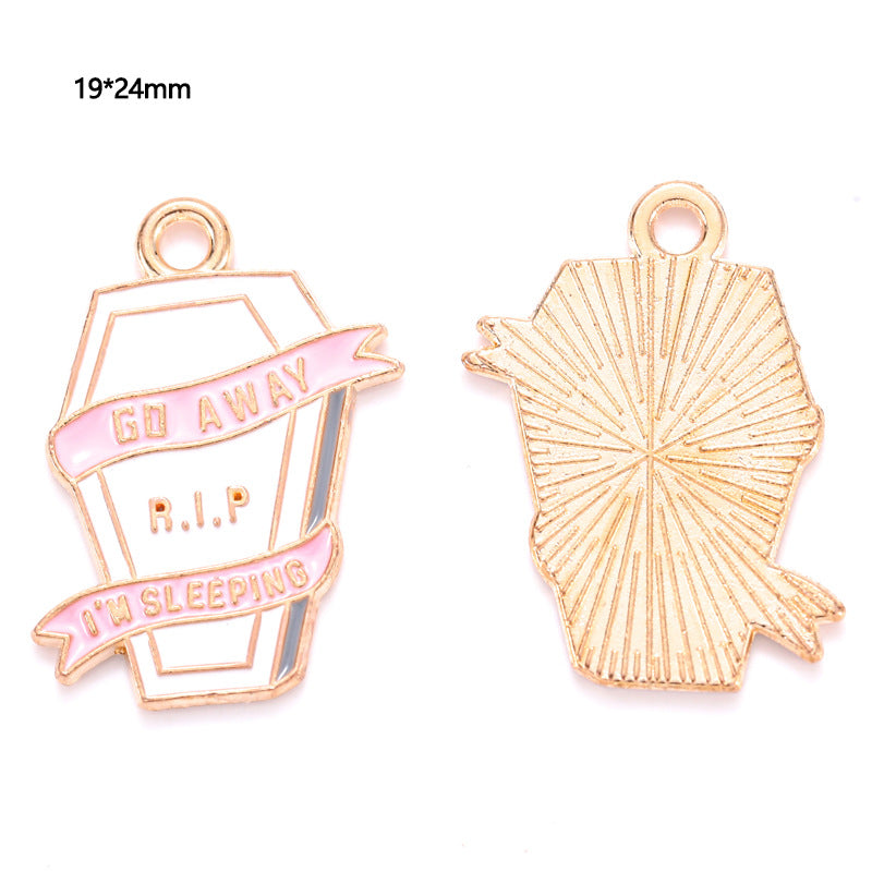 Two coffin-shaped charms with pink enamel banners reading Go Away, 19 by 24mm