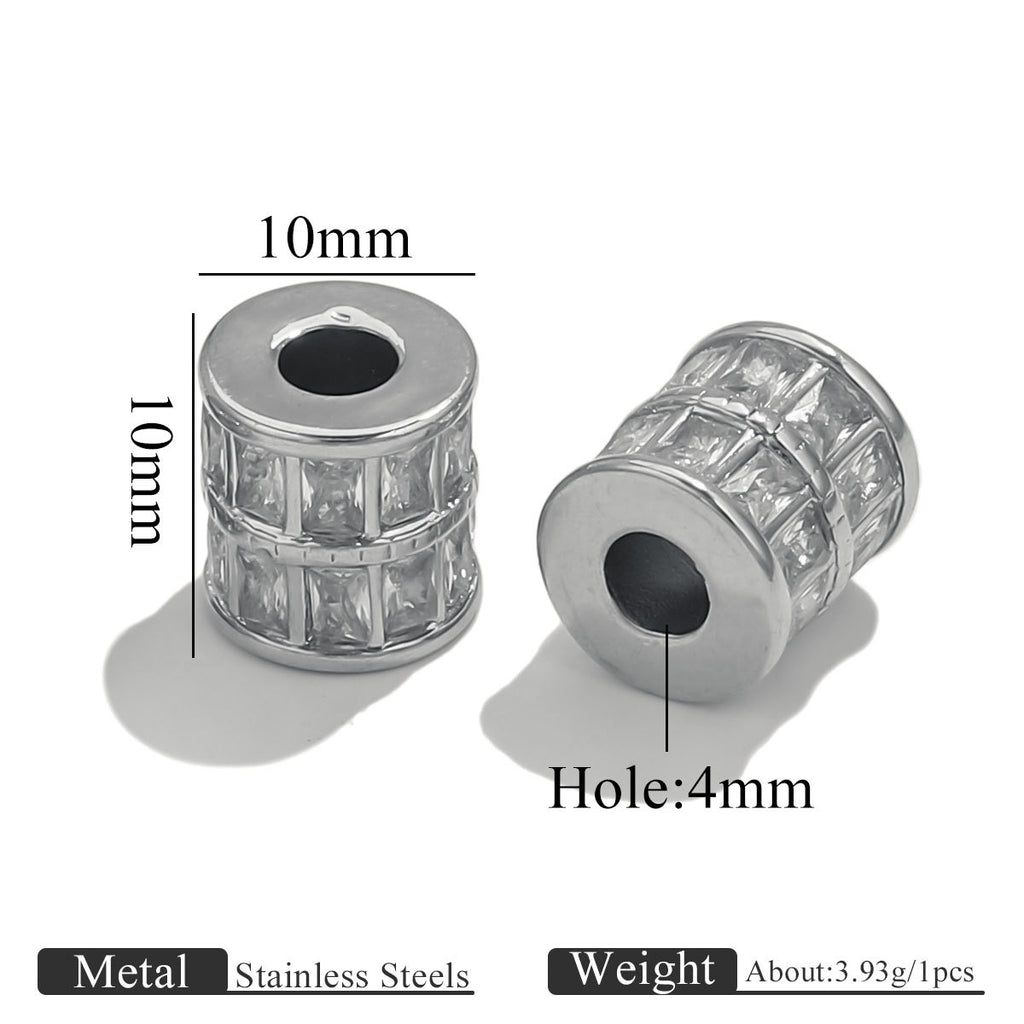 Two silver cylindrical spacer beads with clear rhinestone-like accents, shown on a white background with dimension labels reading 10mm width and 10mm height, plus a note that the center hole is 4mm. Text at the bottom states metal stainless steels and weight about 3.