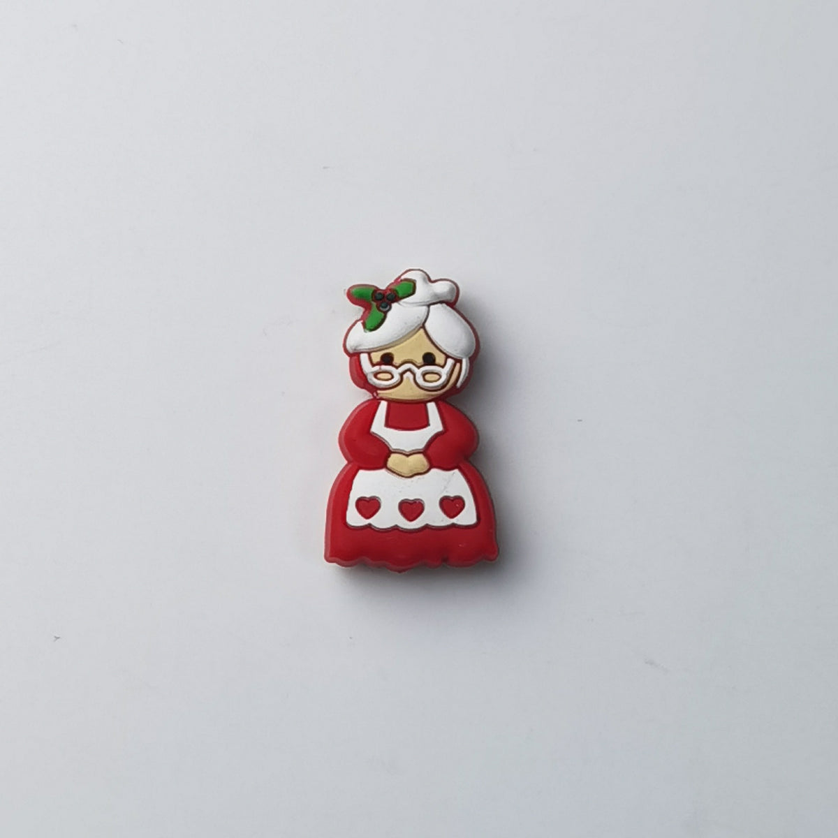 Mrs. Claus silicone focal bead in red dress and white apron with hearts, white hair, glasses and holly accent