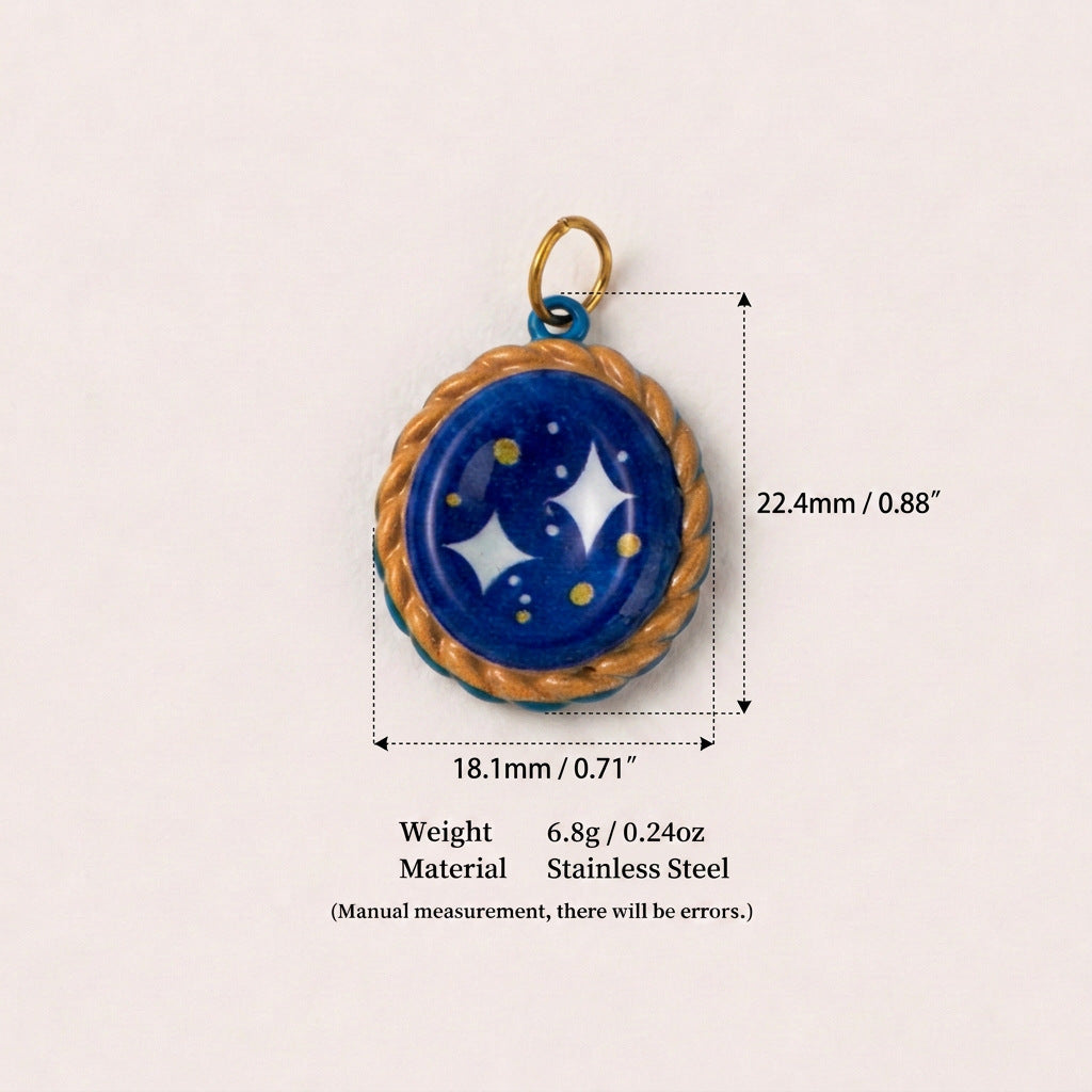 Blue and gold oval celestial pendant charm with star design and size measurements on white background.