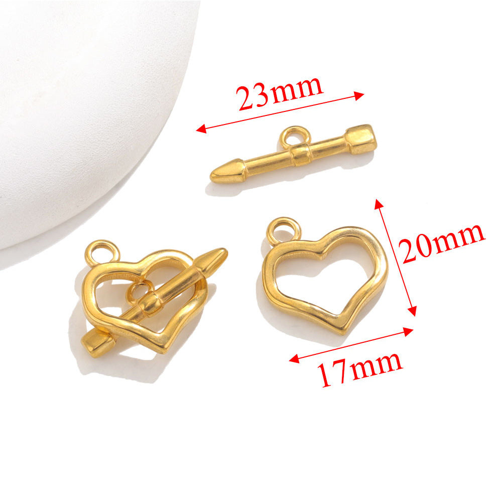 Gold heart-shaped toggle clasps with red dimension arrows showing 23mm, 20mm, and 17mm on white background