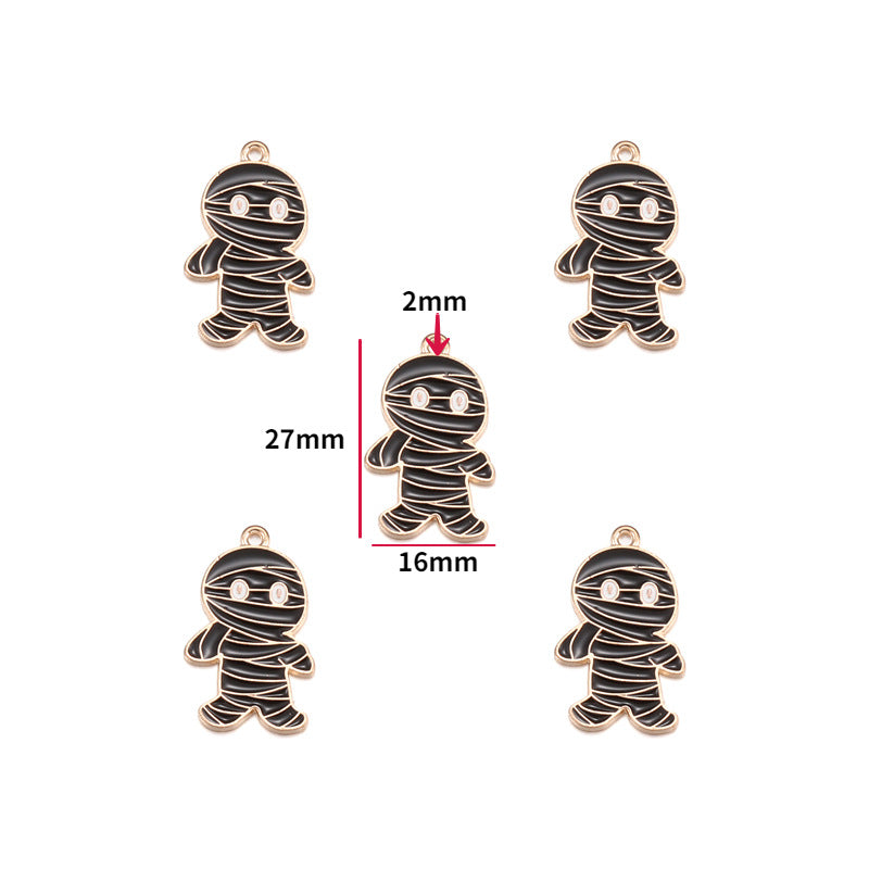 Four black and white striped mummy-shaped jewelry charms with gold-tone edges, 27mm by 16mm size shown