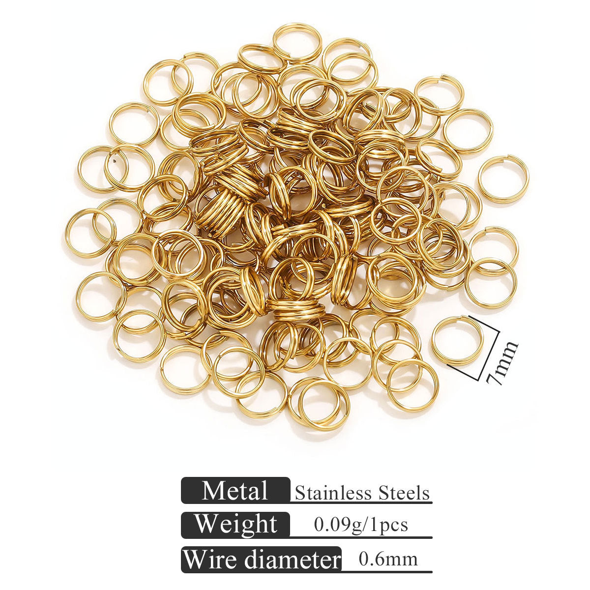 Small gold-colored stainless steel split rings on white with 7mm size indicator