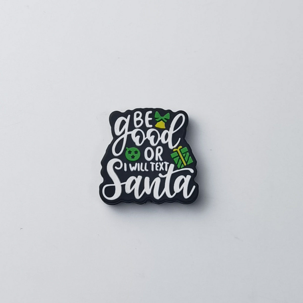 Black square silicone focal bead with white script text reading 'Be good or I will text Santa'