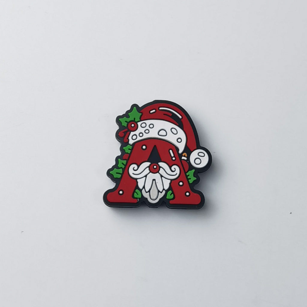 Red silicone letter A focal bead with Santa Claus face, white beard, red hat and green holly leaves