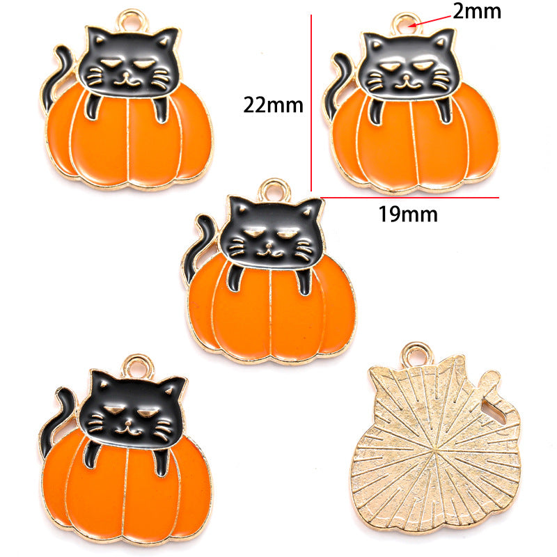 Five pumpkin charms with black cat on top and gold outline, 22mm by 19mm