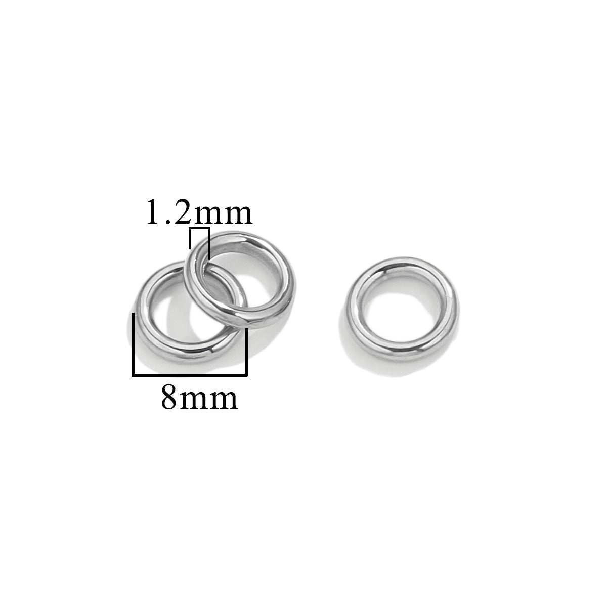 Three silver-tone closed jump rings, 8mm size with 1.2mm wire thickness, on white background