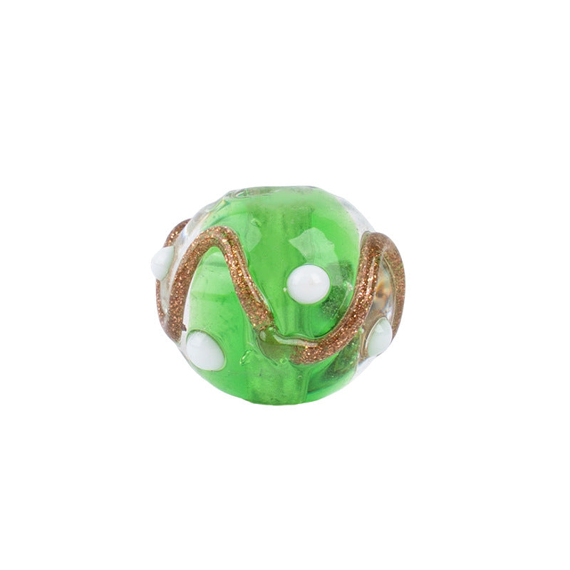 Single green gold-sand swirl glass bead with gold glitter border