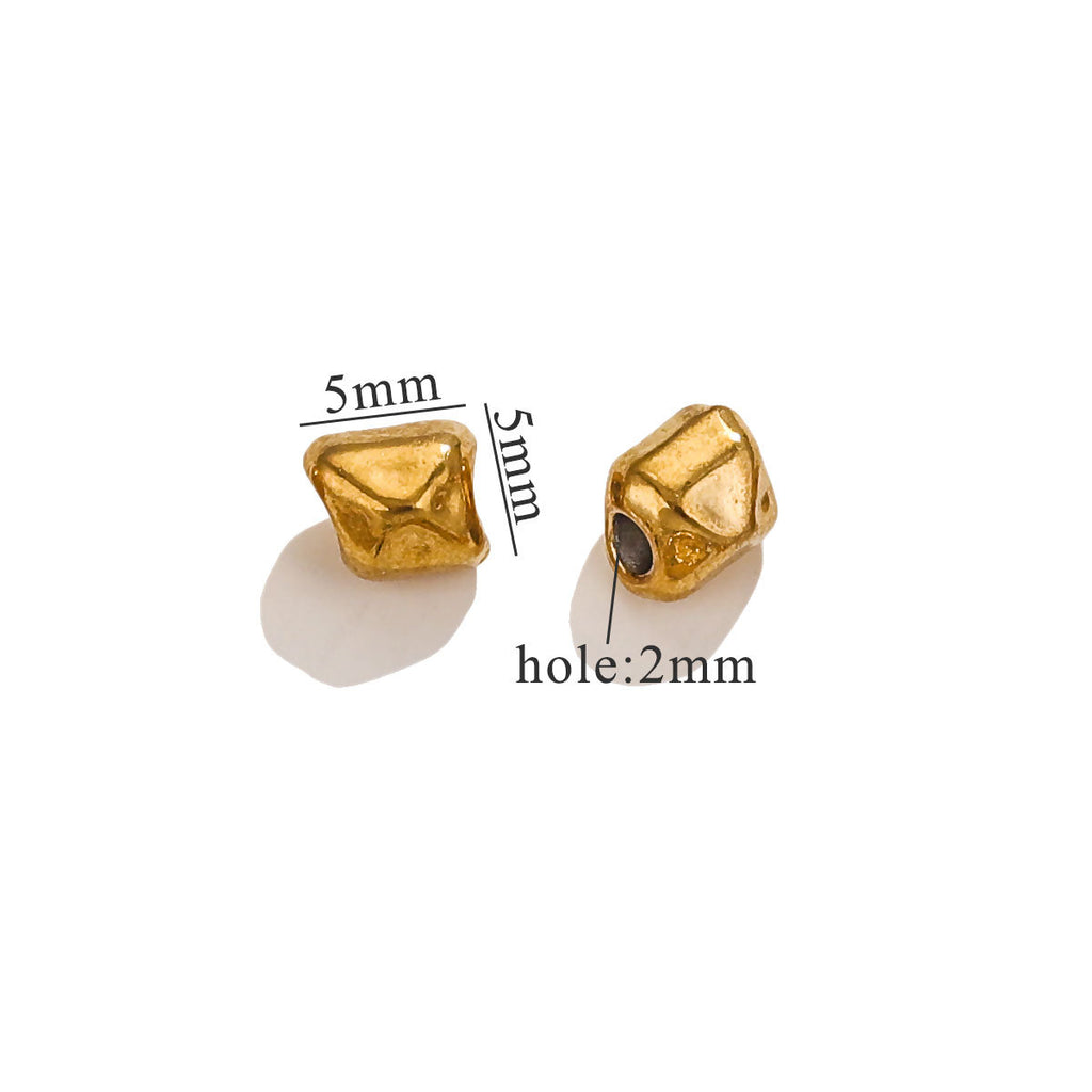 Gold-plated baroque irregular cube spacer beads with size measurements on white background