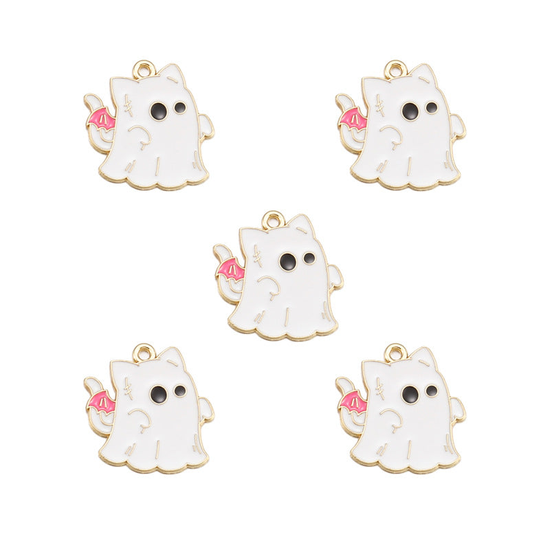 Five white ghost-shaped charms with gold-tone outlines, black eyes, and small pink accents, arranged on a plain white background.