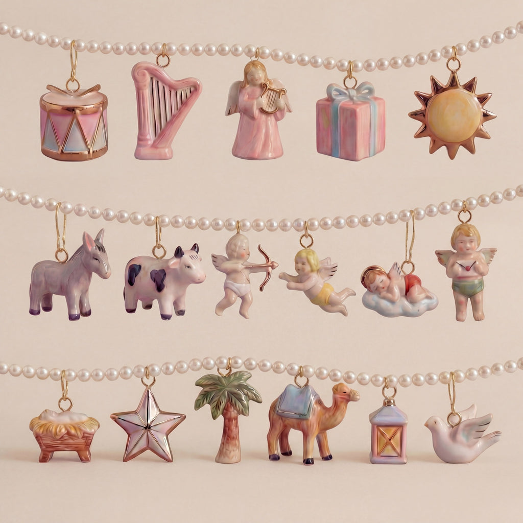 Collection of small figurines and charms on a string against a beige background