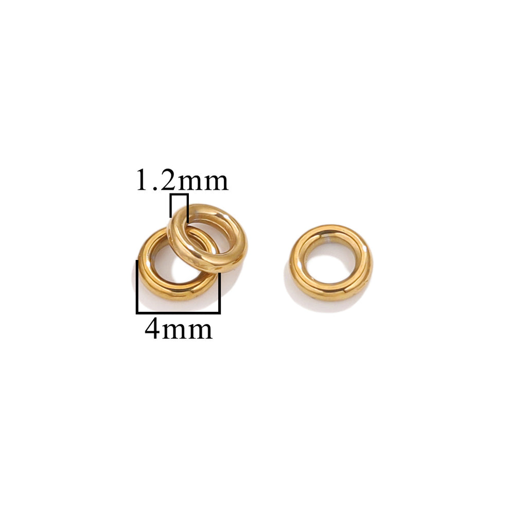 Three gold-tone closed jump rings, 4mm size with 1.2mm wire thickness, on white background