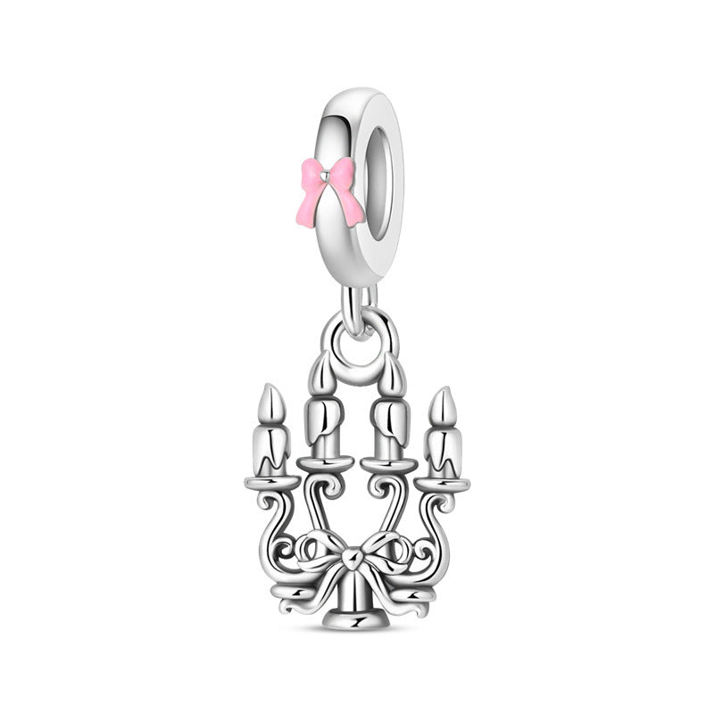 Silver-plated chandelier candelabra dangle charm with five candles and pink bow on bail