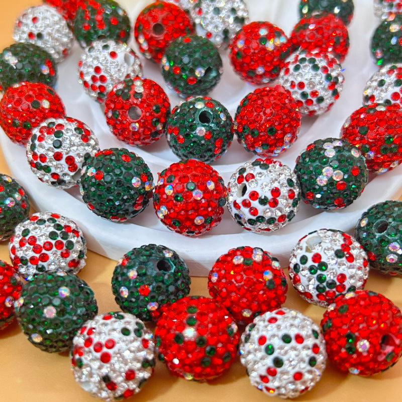 Strands of Christmas Shamballa-style rhinestone beads in red, green, and silver.
