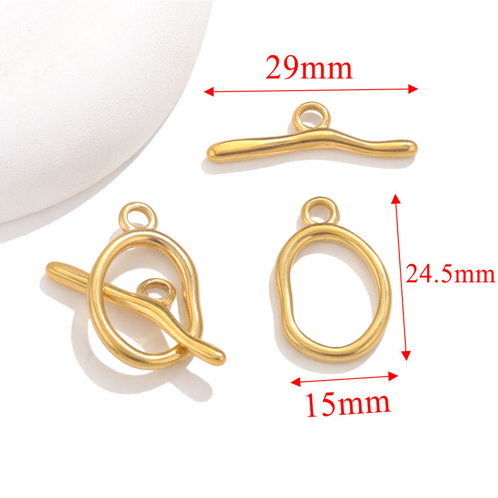 Gold oval toggle clasps with red dimension arrows showing 29mm, 24.5mm, and 15mm on white background