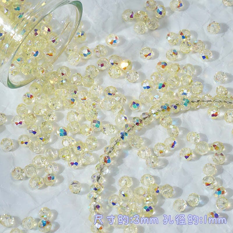 Clear faceted round beads with an iridescent rainbow coating, scattered on a white textured surface with a glass container tipped to release more beads. Purple text at the bottom indicates dimensions: 3mm diameter and 1mm hole size.