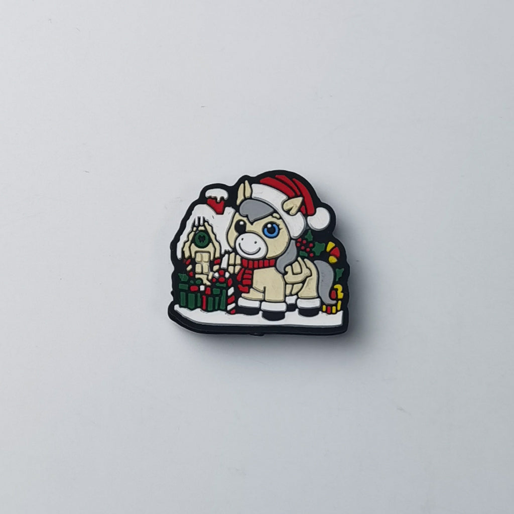 Cream horse silicone focal bead with gray face and mane, red Santa hat, red scarf and gift boxes on snow