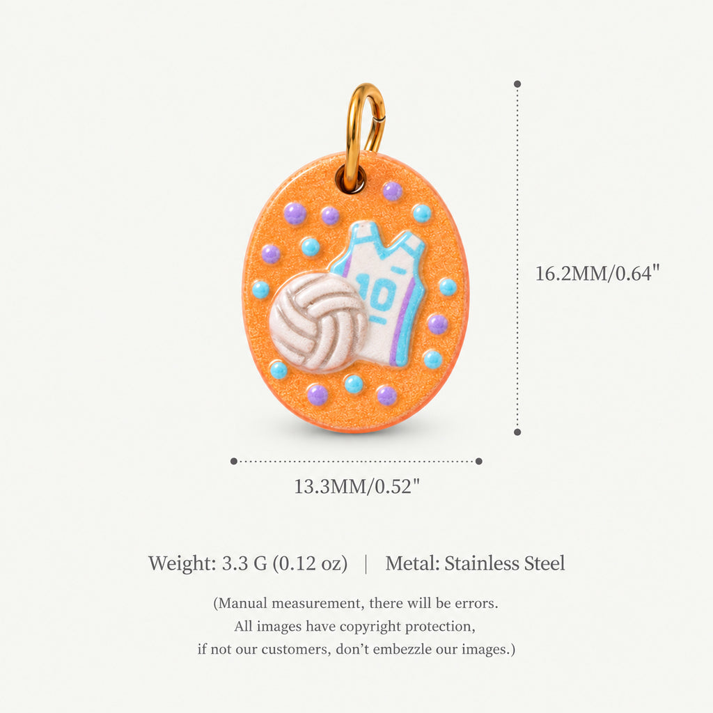 Oval orange volleyball charm pendant with white volleyball and jersey, shown with size measurements.