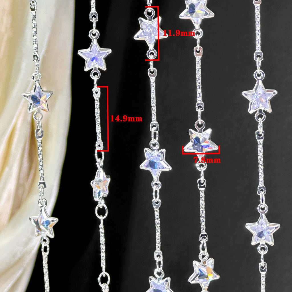Silver-tone star-shaped beaded curtain or door hanging chain with clear rhinestone-embellished stars, shown against a black background with red dimension callouts indicating measurements.