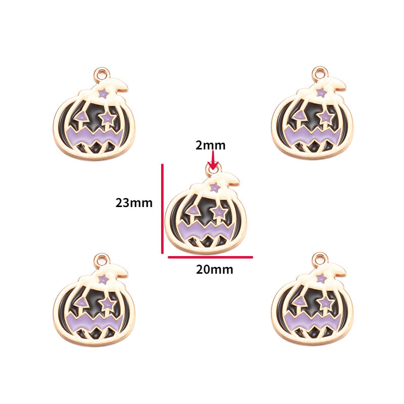Five pumpkin-shaped charms with a gold-tone outline and purple star details, with one central charm overlaid with red dimension lines showing 23mm height, 20mm width, and 2mm loop size on a white background.