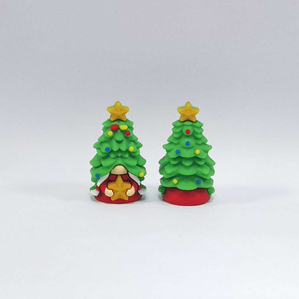 Two green Christmas tree silicone focal beads with yellow stars, colorful ornaments and red bases