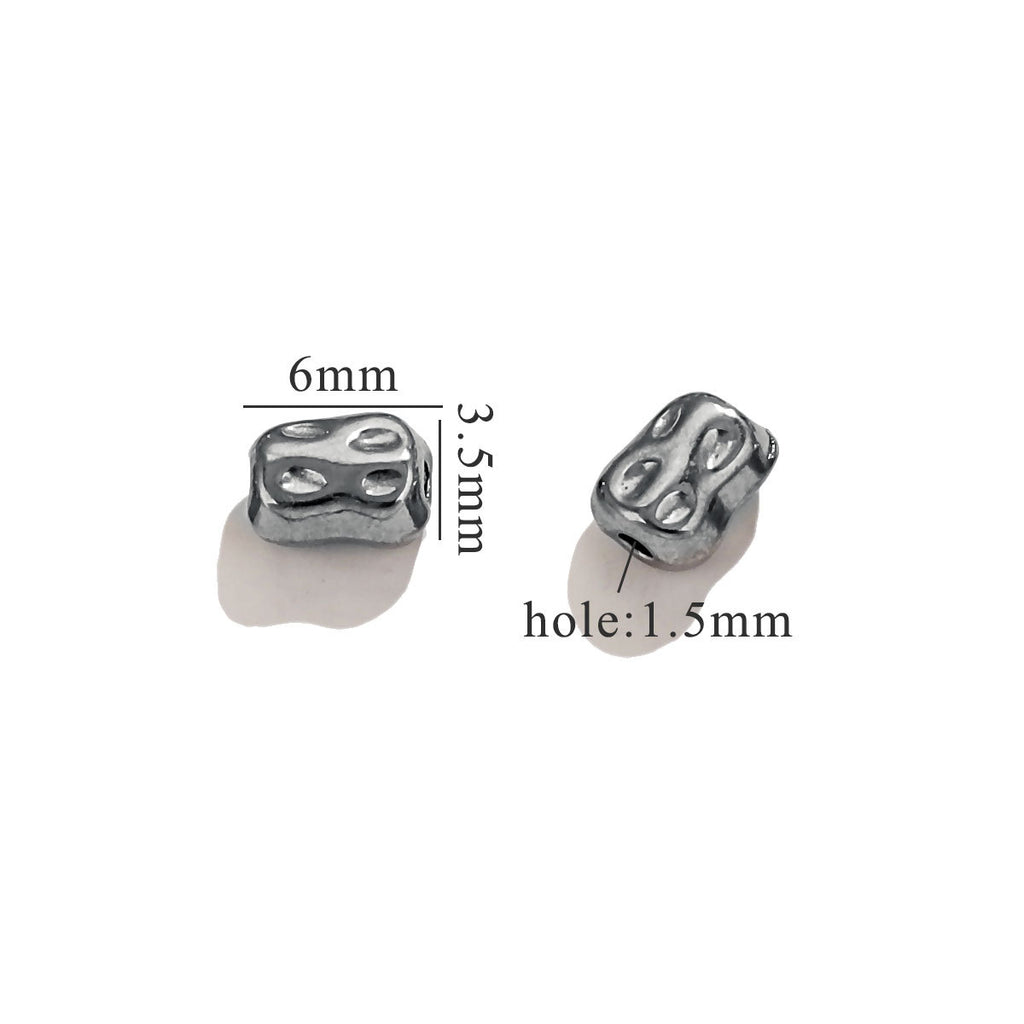 Two steel-color baroque irregular spacer beads with size measurements on white background