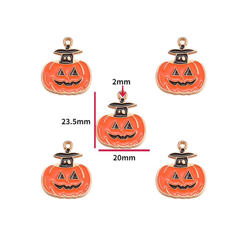 Five orange jack-o'-lantern charms with black witch hats and gold-tone outlines are shown on a white background, with one center charm annotated with dimensions 23.5mm, 20mm, and 2mm.